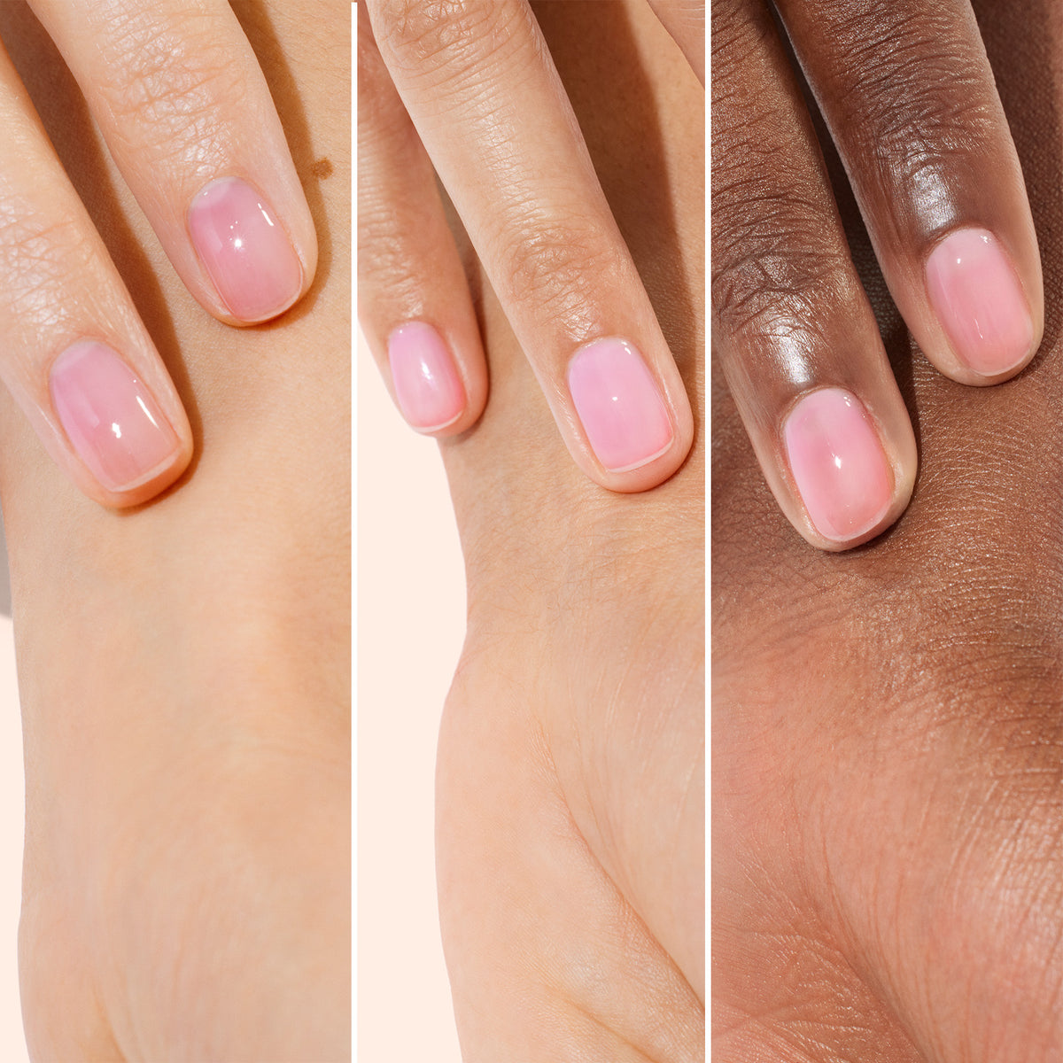 Trois mains aux carnations différentes, affichant chacune des ongles au rendu naturel avec un fini rose clair brillant, sont présentées côte à côte sur un fond neutre — illustrant les résultats du soin des ongles nourrissant et végétal Active™ Glow Blueberry de Manucurist, un perfecteur d&