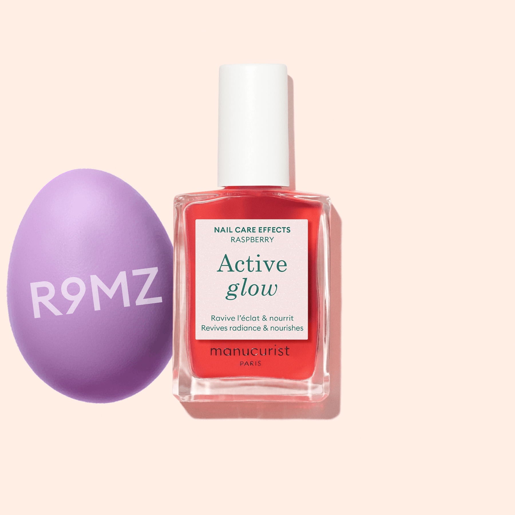Manucurist Active Glow Raspberry, a plant-based nail enhancer, is displayed in a clear bottle with a white cap and pink label, set against a pale pink background.