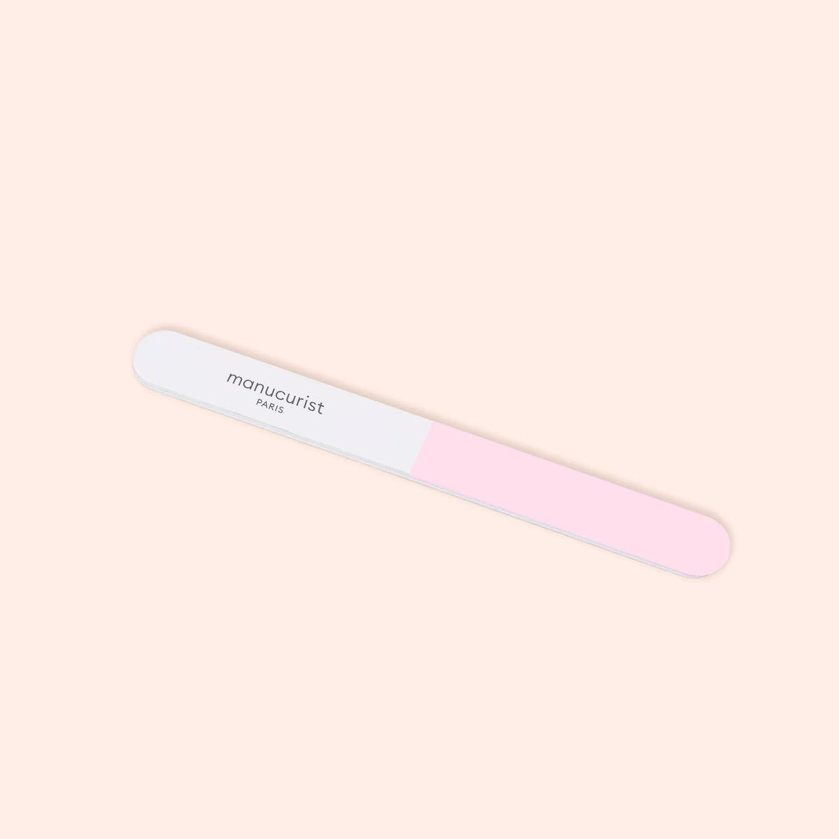La lime polissoir 3 faces Manucurist, avec ses faces rose et blanche et l&
