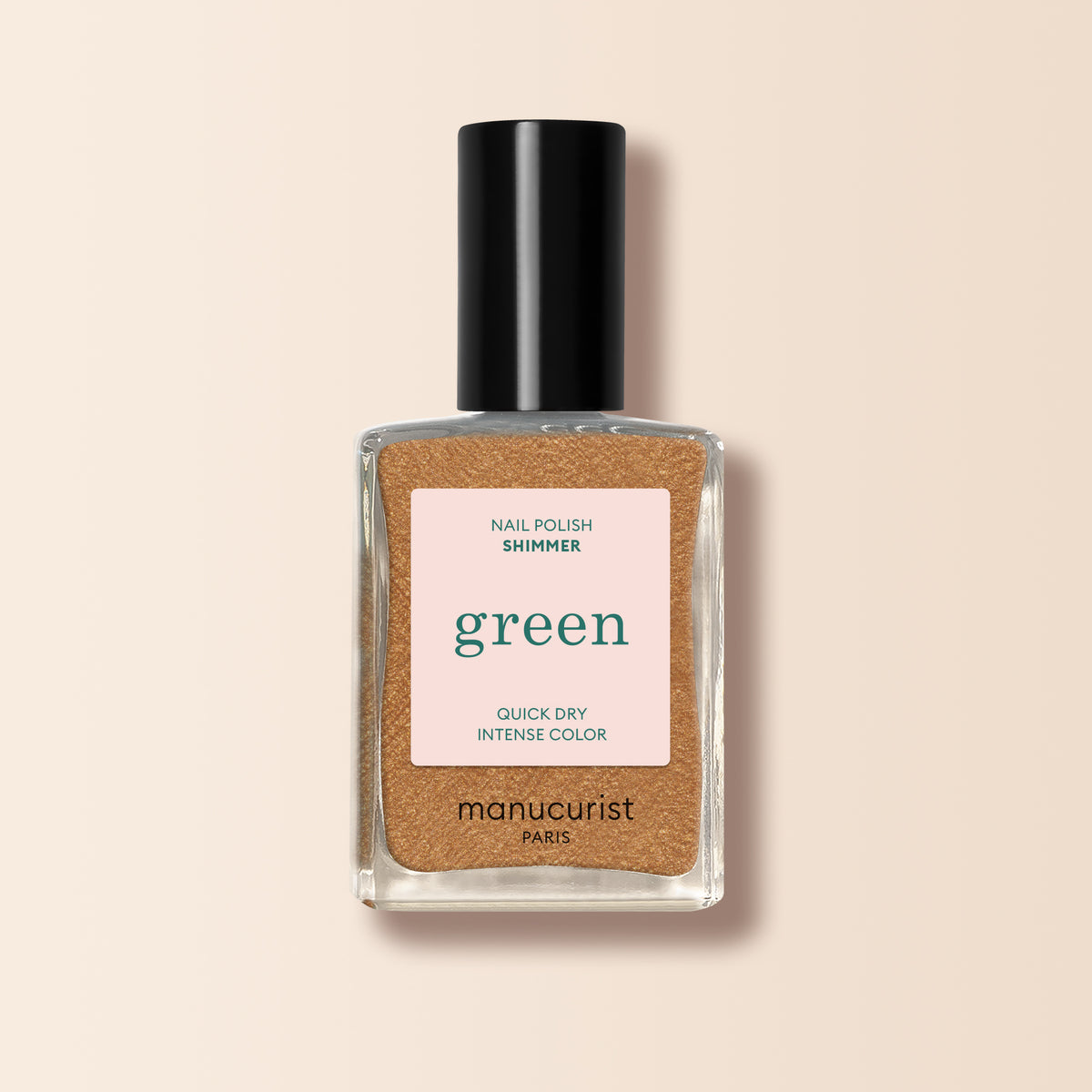 Un flacon en verre transparent de vernis à ongles Shimmer Manucurist dévoile une teinte bronze miellée et scintillante, une formule à séchage rapide et une couleur intense, surmonté d&