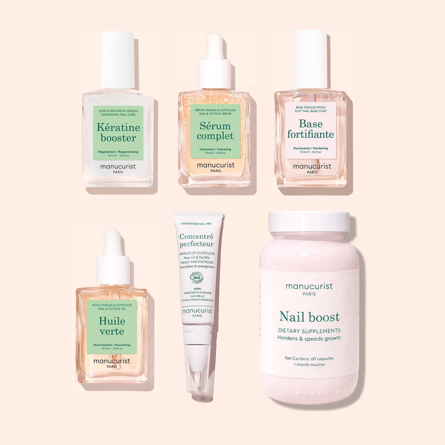 Six Manucurist Ultimate Routine - Soft Nails products, designed for nail strengthening and including serums, oils, and a supplement, are arranged neatly on a light beige background. Each product is presented in a clear or white bottle or jar with French labels and pastel-colored liquid inside.
