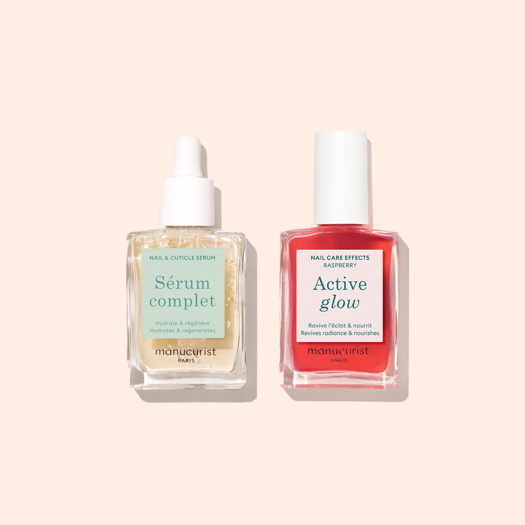 Two square bottles on a light beige background: one clear labeled Sérum complet and one pink labeled Active Glow. Both are part of Manucurist Paris Basic Routine - Sensitive Nails, designed to moisturize and support nail rescue.
