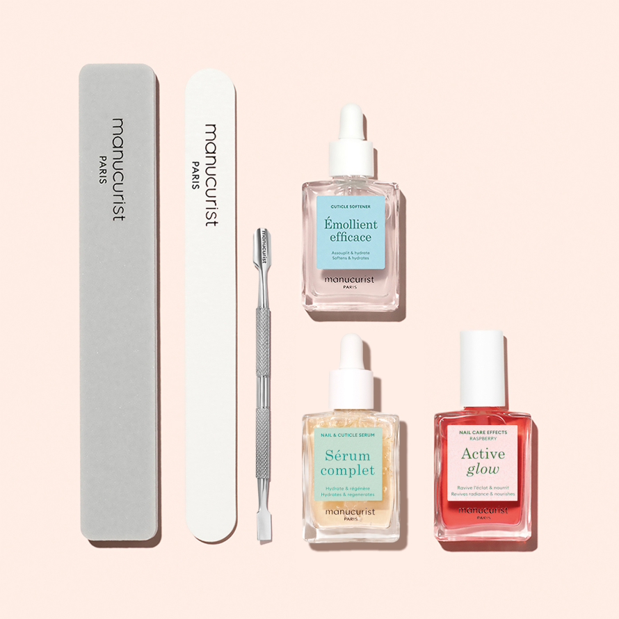 The Manucurist-test Welcome kit Glow Manicure Set includes two nail files, a cuticle pusher, and three nail care serums—Émolient efficace, Sérum complet, and Active glow—displayed on a light pink background.