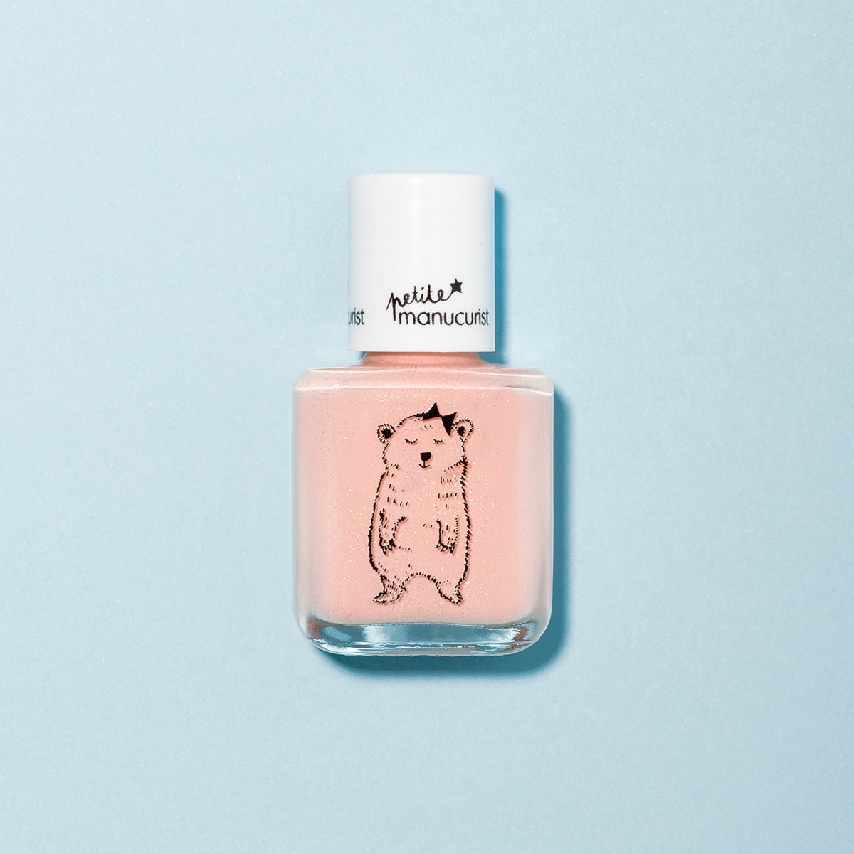 A bottle of Manucurist Joy the Bear Cub light pink kids&