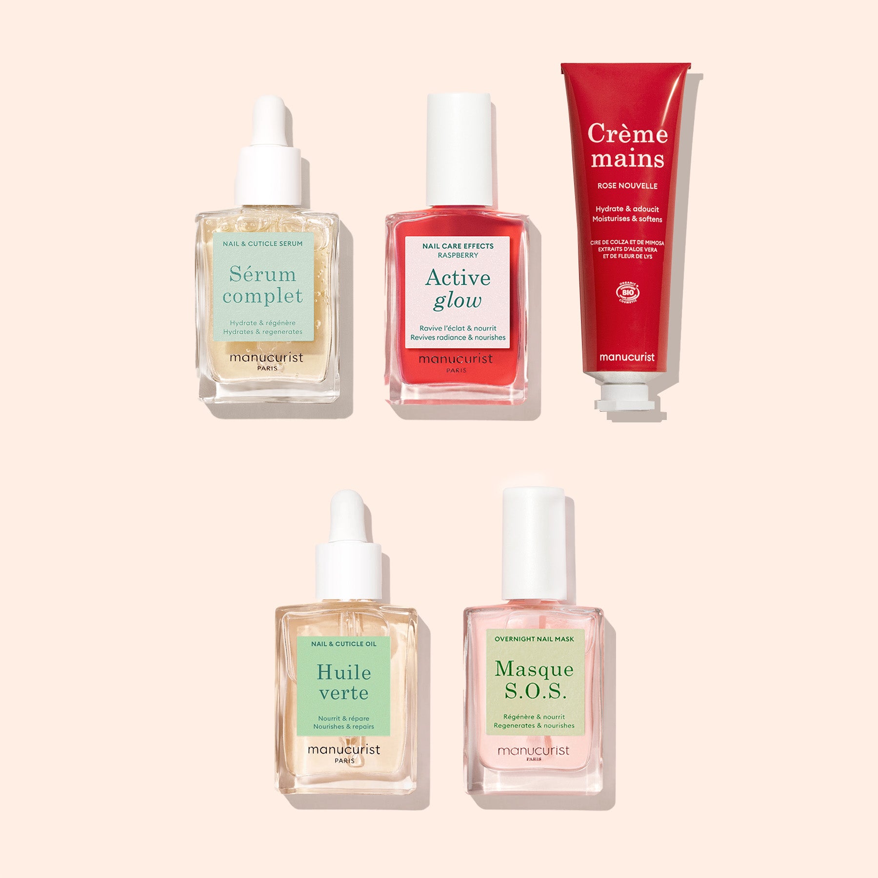 Five Manucurist skincare products on a light beige background: three dropper bottles, one red tube labeled Crème mains, and one red-capped bottle labeled Active glow.