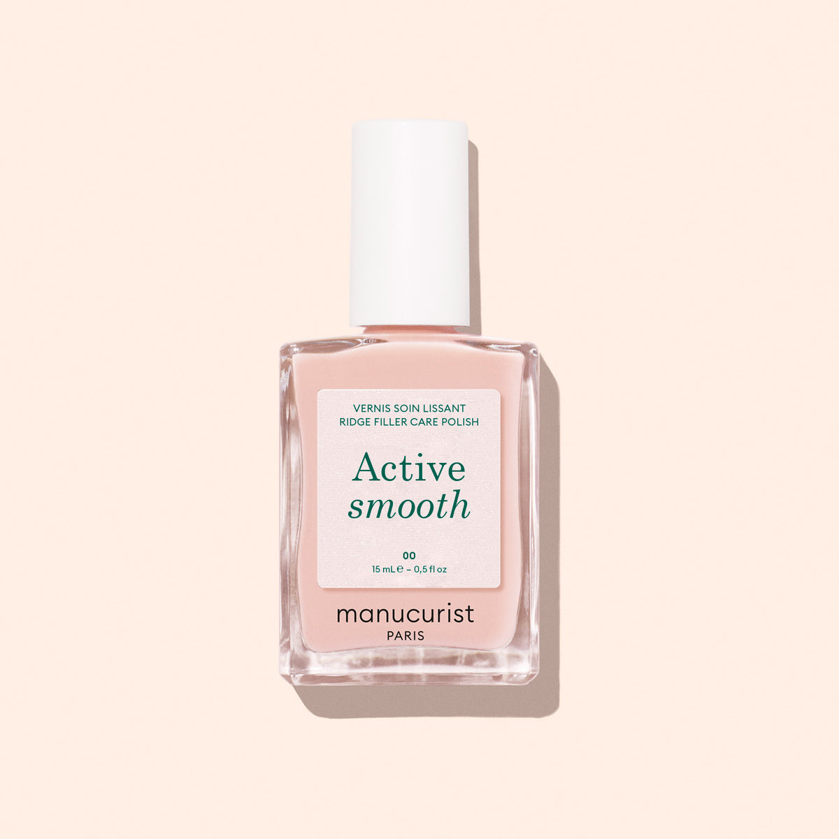 Un flacon de soin pour ongles Manucurist Active™ Smooth 00, surmonté d&