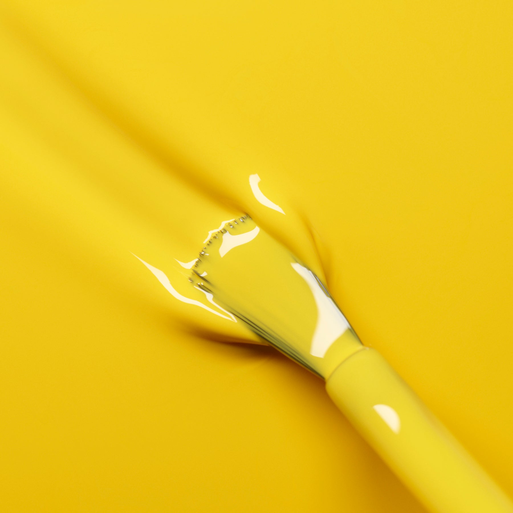 A paintbrush coated with Manucurist&