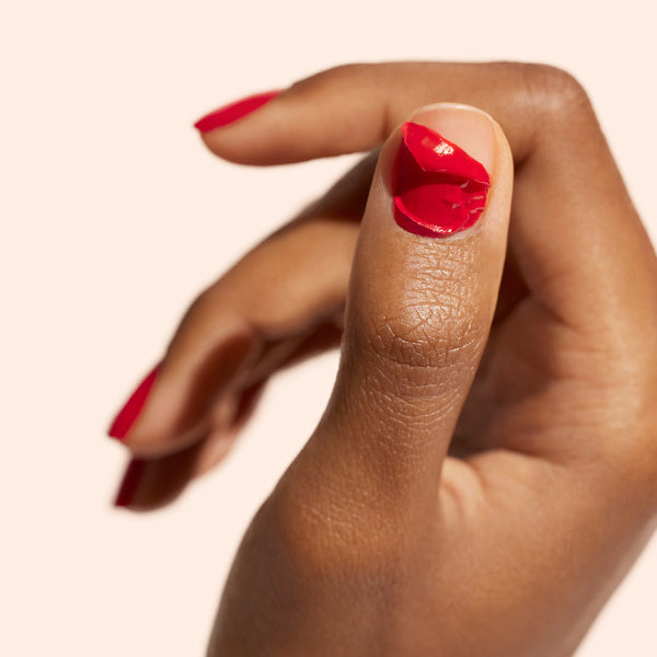 How can you remove semi-permanent nail polish at home without damaging your nails?