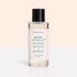 Un flacon transparent du Trio Green™ Base, Top Coat & Dissolvant de Manucurist, avec un capuchon noir et une étiquette rose pâle, présenté sur un fond clair — idéal pour retirer efficacement même le vernis vert ou la manucure effet gel les plus tenaces.