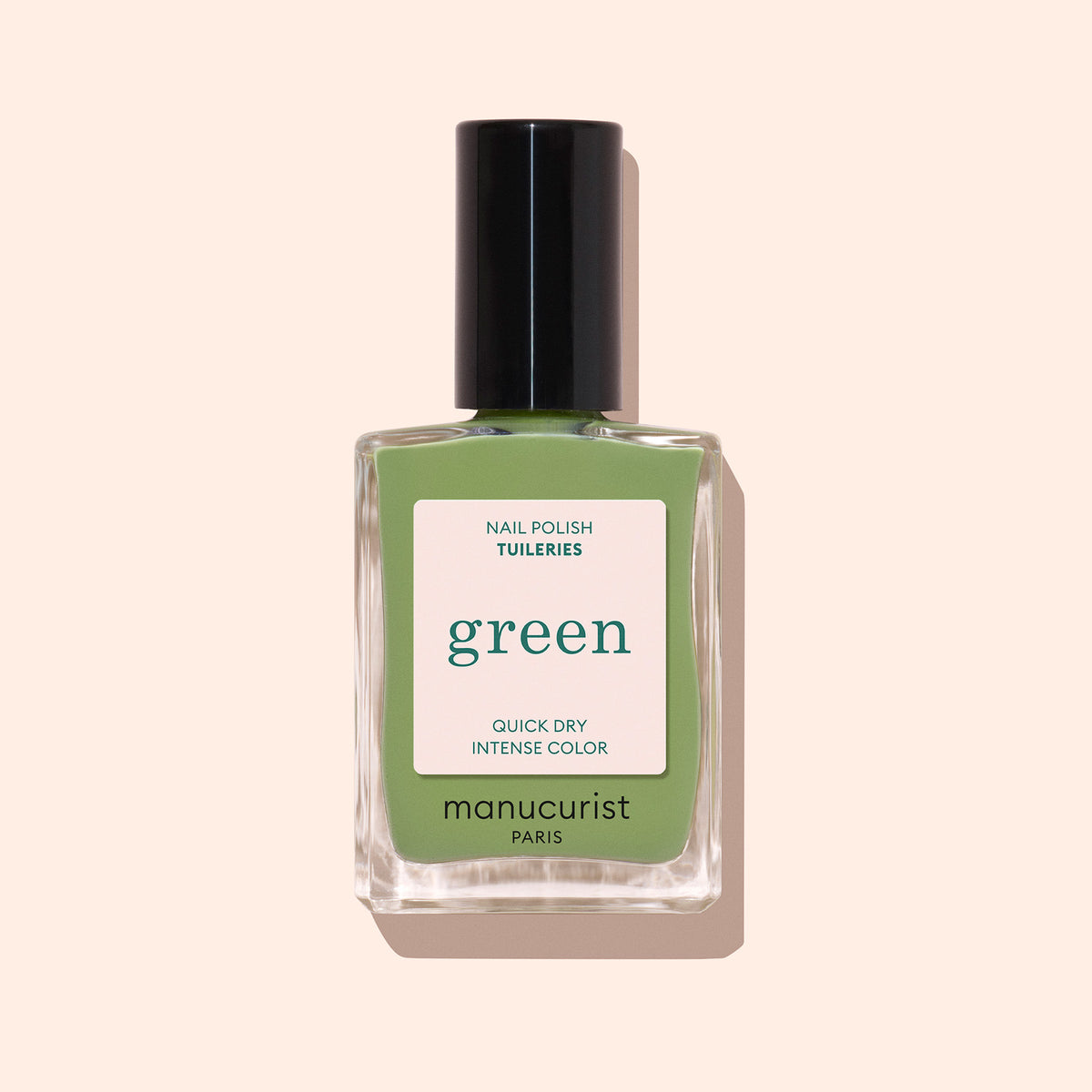 Manucurist Tuileries is a light olive green nail polish, featuring a black cap and minimalist white label, displayed against a light beige background.