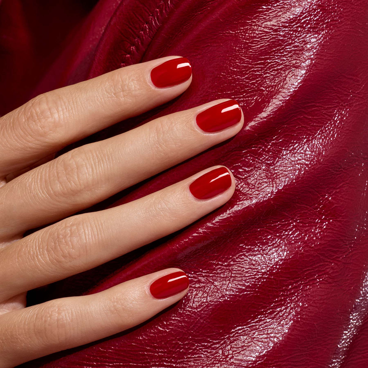 A close-up of a hand with neatly manicured nails painted in Manucurist&