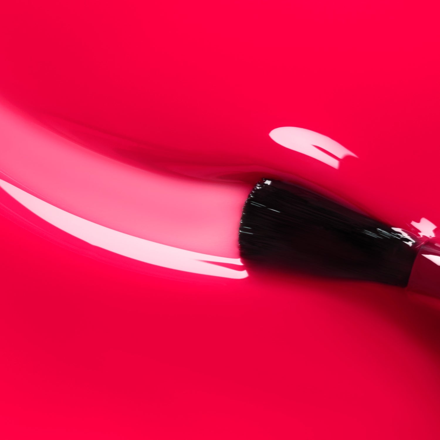 A close-up of a makeup brush applying Manucurist’s Pomme d&