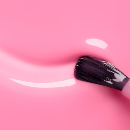 A close-up of a brush applying Manucurist&