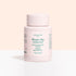 A light pink plastic container labeled Magic Dip Remover by Manucurist, this acetone-free express nail polish remover is perfect for travel touch-ups, shown against a pale beige and white background.