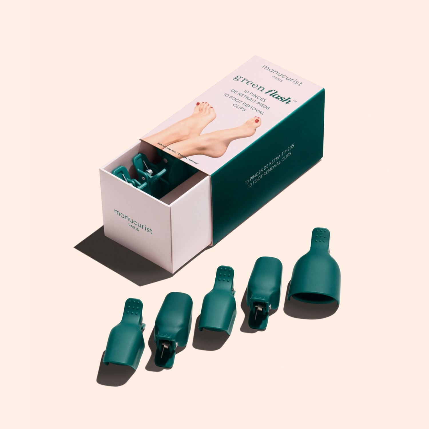 A green Manucurist box labeled "Foot Removal Clips" contains five clips for gel polish pedicure removal, showing illustrated feet on the pack. Ideal for use with acetone-free Remover for gentle, effective results.