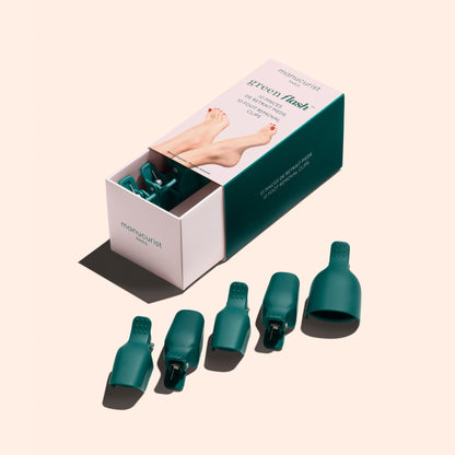 A green Manucurist box labeled "Foot Removal Clips" contains five clips for gel polish pedicure removal, showing illustrated feet on the pack. Ideal for use with acetone-free Remover for gentle, effective results.