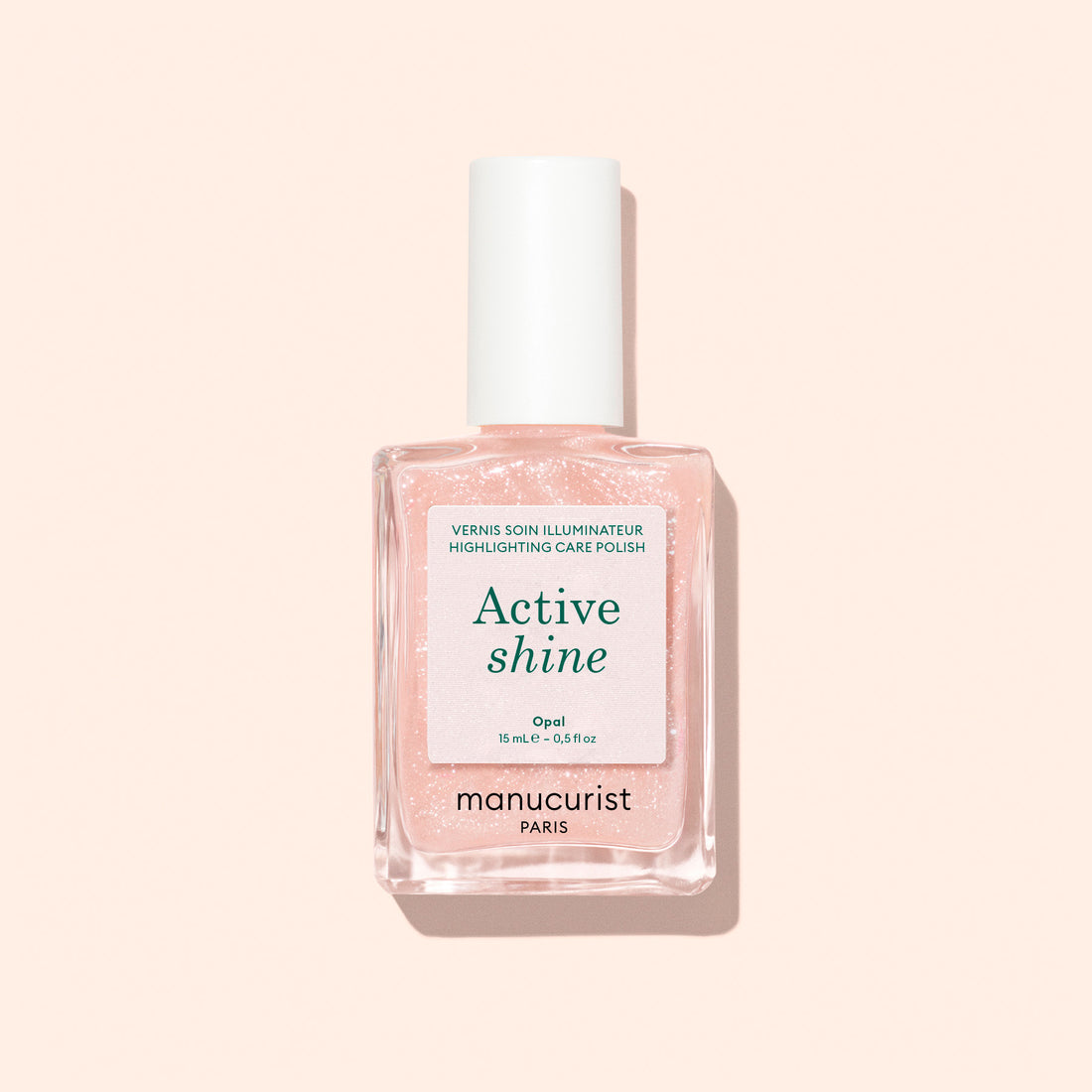 Un flacon de vernis végétal Manucurist Active™ Shine, doté d&