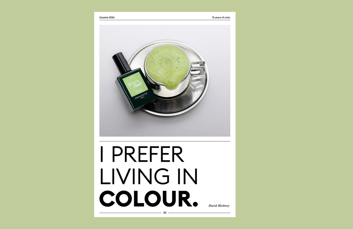 A cup of matcha latte and a green perfume bottle on a saucer. Below, bold text reads: I PREFER LIVING IN COLOUR. – David Hockney. The background is pale green.