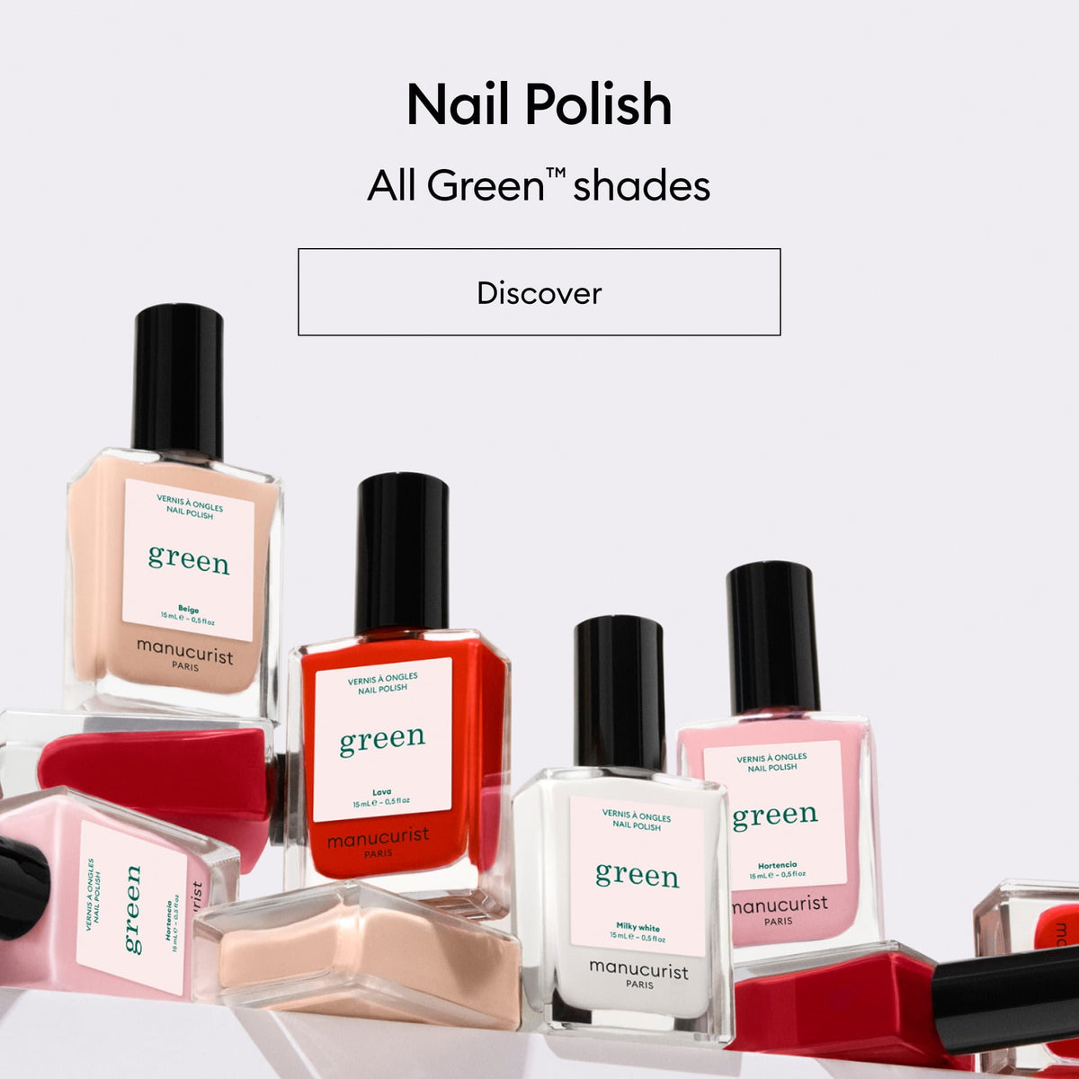 Des flacons de vernis à ongles Manucurist Paris de différentes couleurs et étiquetés Green sont disposés sur un fond blanc, surmontés du texte « Vernis à ongles - Toutes les teintes Green - Découvrir ».