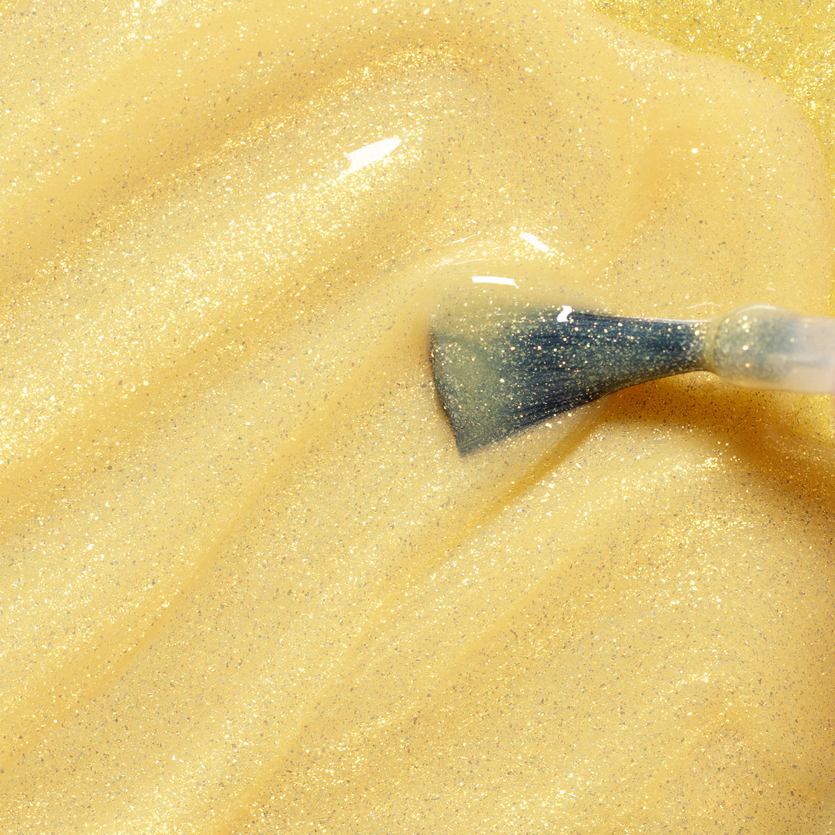 The Manucurist Pia the Bee brush glides shimmery yellow glitter kids&