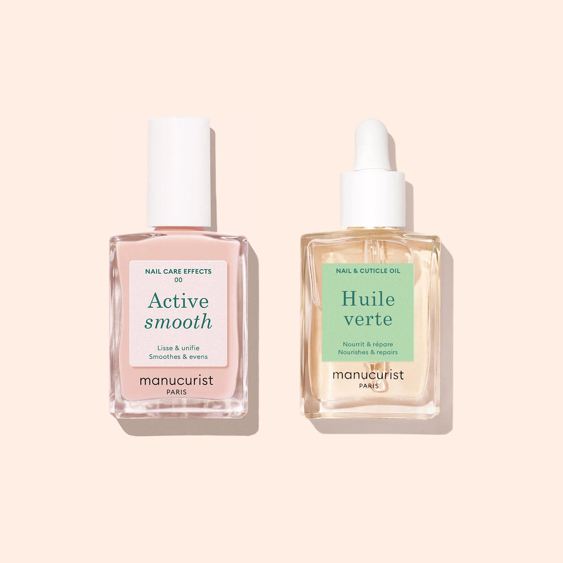 Two square glass bottles of Manucurist nail treatments rest on a beige surface. On the left is Basic Routine - Ridged Nails, while the right bottle with a dropper contains Huile Verte cuticle oil.