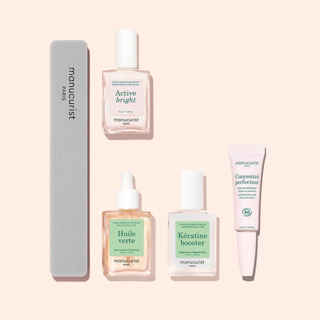 The Manucurist Starter Routine - Yellow Nails set includes five essential nail care products—a nail file and four treatment bottles (Active Bright, Huile Verte, Kératine Booster, and Concentré Perfecteur)—all arranged neatly on a pale pink background, perfect for brightening polish and strengthening nails.