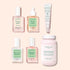 Six essentiels de manucure de l’ensemble Ultimate Routine - Bitten Nails de Manucurist — dont du vernis à ongles, des huiles nourrissantes, un sérum fortifiant pour les ongles et un pot de compléments alimentaires — sont soigneusement disposés sur un fond beige. Avec des étiquettes bilingues en français et en anglais dans des tons verts et roses, cette collection est idéale pour favoriser une repousse saine des ongles ou prendre soin des ongles rongés.