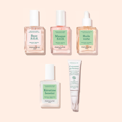 Five products from the Manucurist Starter Routine - Damaged Nails set—including clear and pink bottles with dropper tops for cuticle oil and keratin booster, a white pump bottle, and a white tube designed for nail repair—are arranged neatly on a beige background. Each product features a soft green and white label.