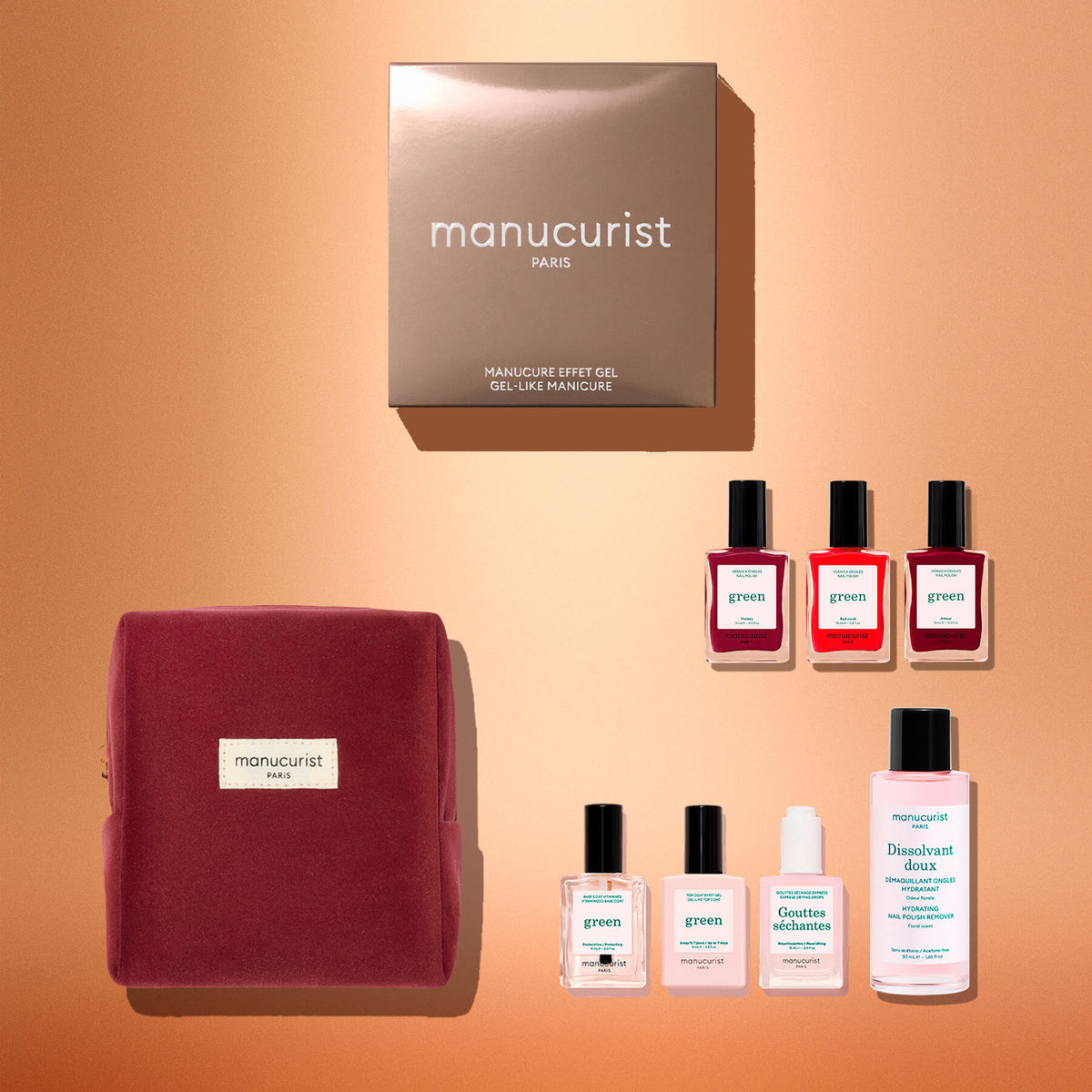 The Manucurist Green™ Starter Kit Gift Set features a pink pouch, a gold box, four bottles of naturally derived nail polish for a gel effect manicure, and three nail care bottles, all elegantly arranged on a peach-colored background.