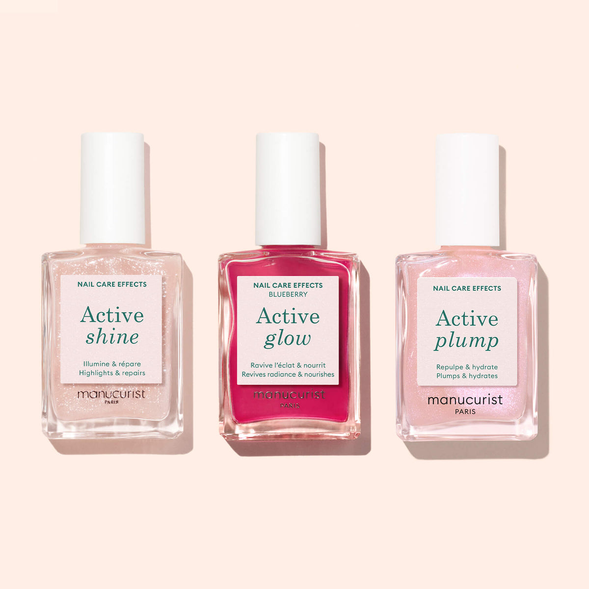 Trois flacons de vernis soin des ongles d’origine végétale Manucurist Active™ Shine Opal, chacun conçu pour offrir des bienfaits uniques de renforcement et de soin grâce à leurs teintes distinctes — Active Shine, Active Glow et Active Plump — sont disposés côte à côte sur un fond clair.