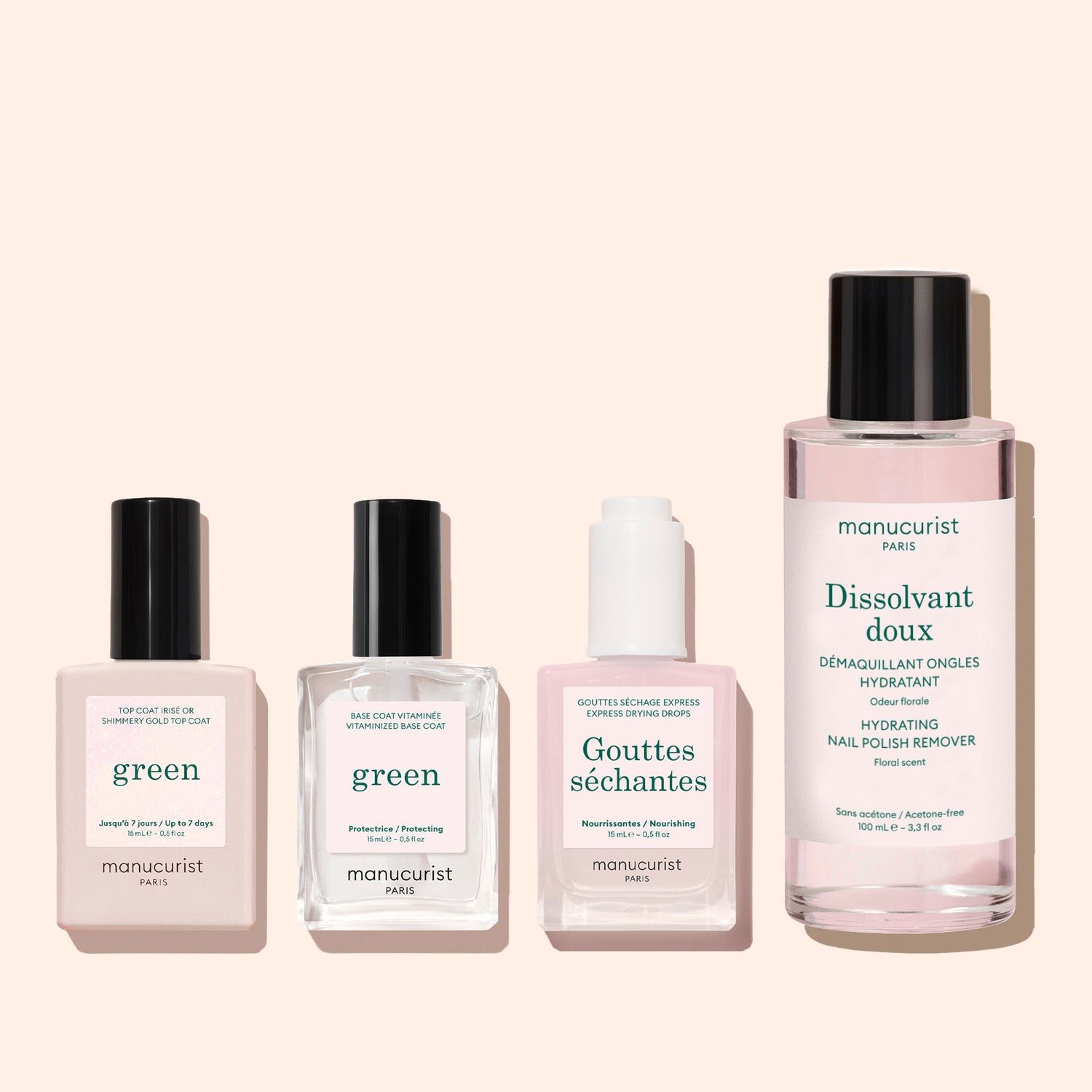 Four Manucurist bottles, including the Glitter Top Coat, are arranged in a row on a light pink background.