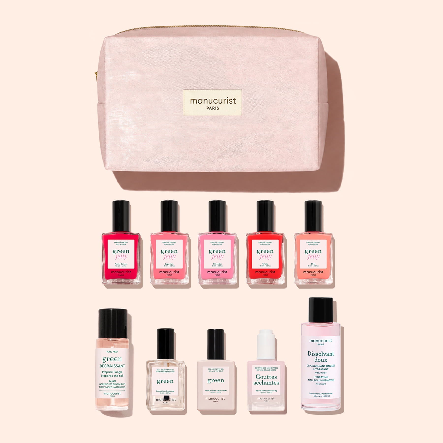 A pink Manucurist Super Starter Kit - Jelly Nail Polish pouch from Manucurist, featuring ten plant-based nail care products—including vibrant gel-effect nail polishes and a variety of nail and cuticle treatments—arranged in two rows on a light beige background, perfect for achieving an eco-friendly manicure.