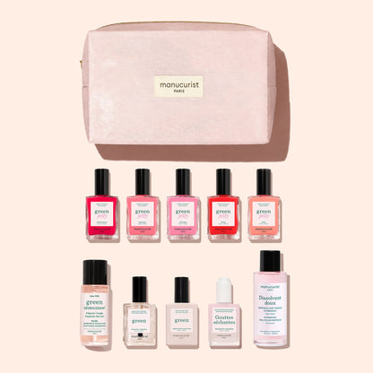 A pink Manucurist Super Starter Kit - Jelly Nail Polish pouch from Manucurist, featuring ten plant-based nail care products—including vibrant gel-effect nail polishes and a variety of nail and cuticle treatments—arranged in two rows on a light beige background, perfect for achieving an eco-friendly manicure.