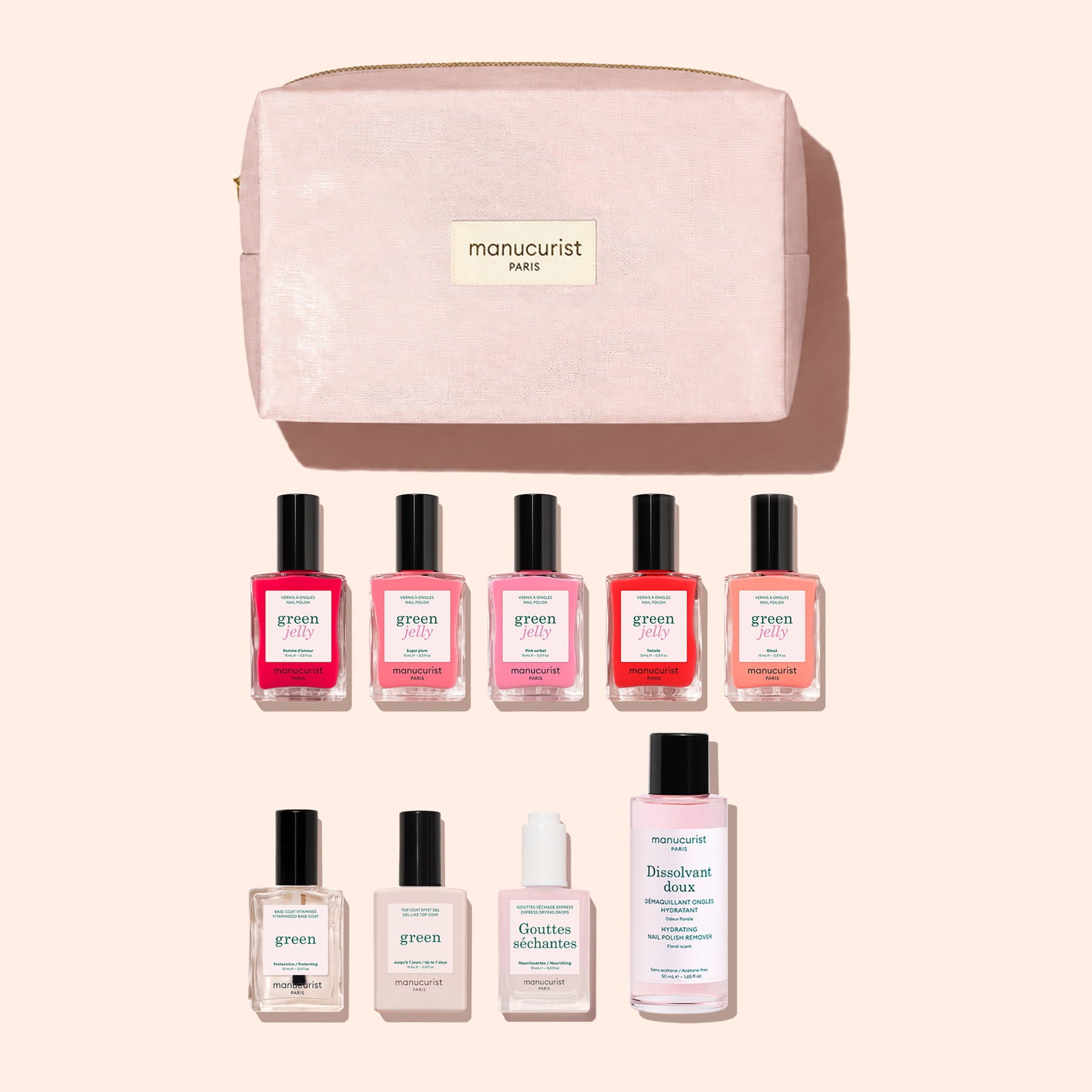 A pink cosmetic bag featuring the Manucurist logo is displayed above the Super Starter Kit - Jelly Nail Polish by Manucurist. The kit includes nine nail care products—colorful gel effect polishes crafted with plant-based ingredients, a remover, a serum, and a top coat—all neatly arranged on a beige background.