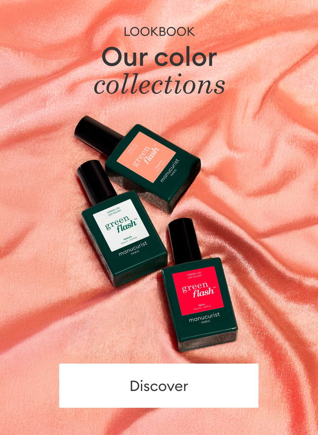Three bottles of green and red Manucurist nail polish are displayed on shiny pink fabric next to a blue egg with M7XQ written on it. Text above reads, Our color collections. A Discover button is below.