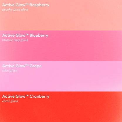 Four horizontal color swatches labeled: Raspberry (peachy pink), Blueberry (intense rosy), Grape (lilac), and Cranberry (coral); each represents a different glossy shade from Manucurist’s Active™ Glow Raspberry collection, inspired by plant-based nail care for radiant, healthy-looking nails.