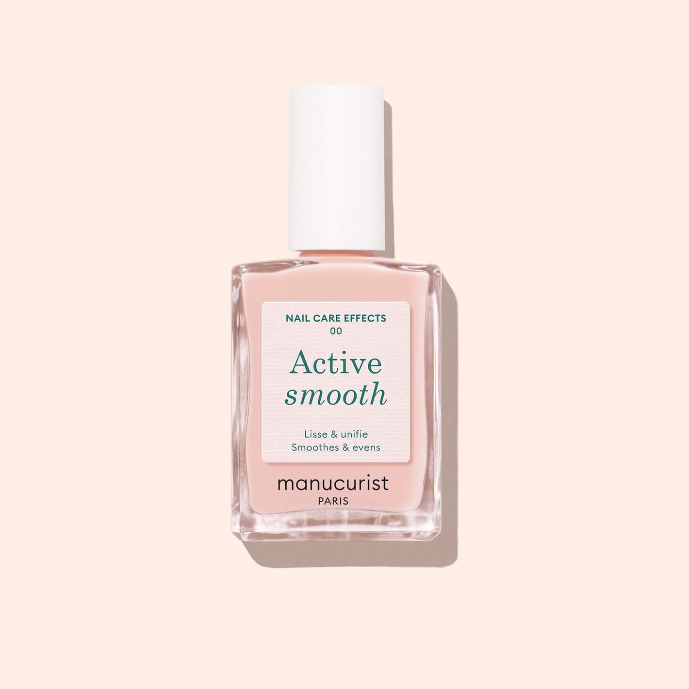 A bottle of Active Smooth 00 A/B TEST nail treatment with a white cap, pinkish liquid, and white label is shown against a light beige background.