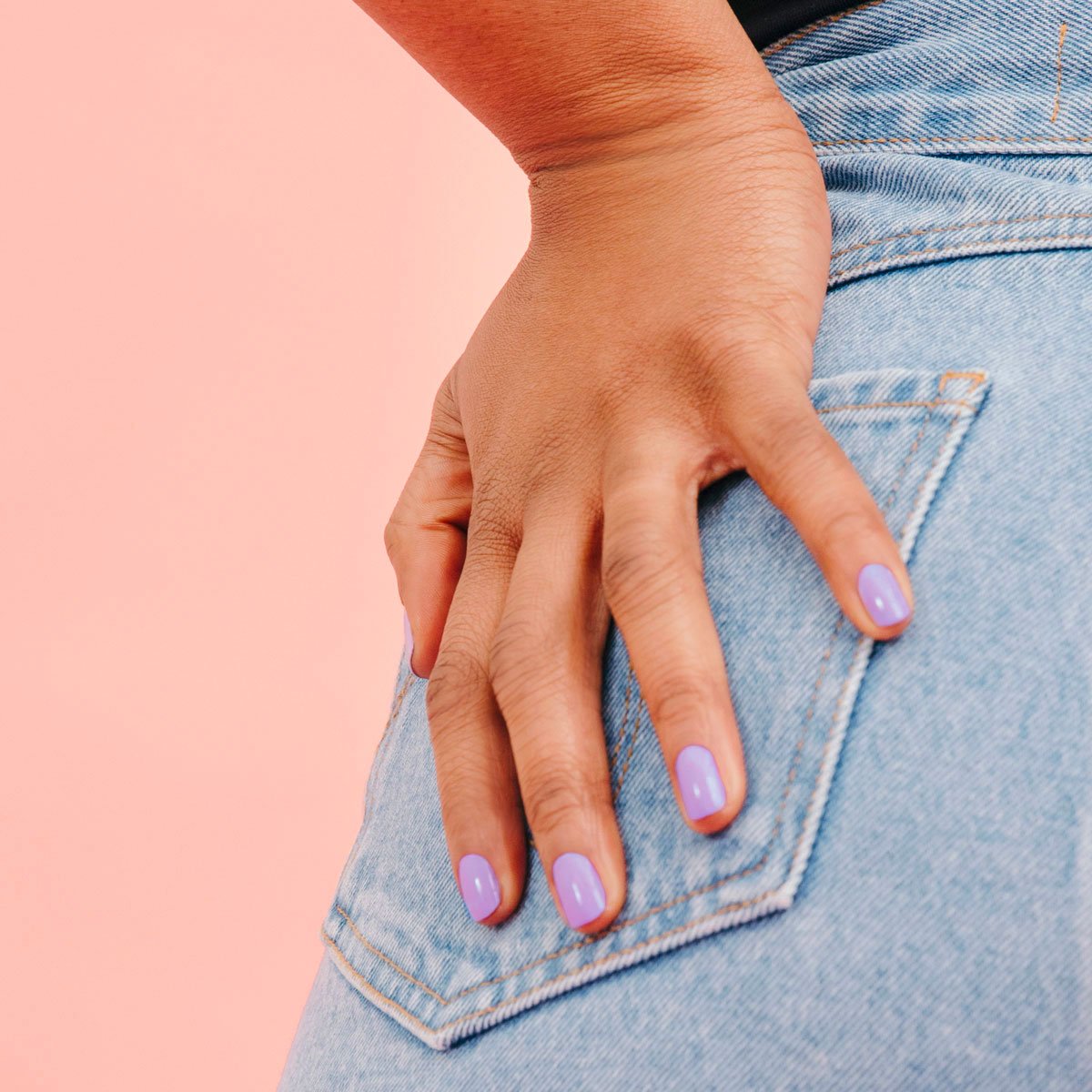A close-up of a person’s hand wearing Manucurist&