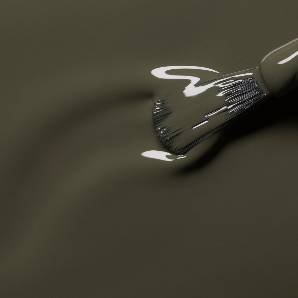 A close-up of a brush applying Manucurist&